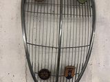 a picture of a bird cage hanging on a wall