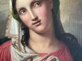 an image of a painting of a woman with a green head scarf
