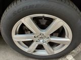 a close up view of a tire on a car
