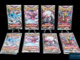 a group of pokemon trading cards on display in front of a black background