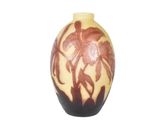 a vase with a flower design on it on a white background