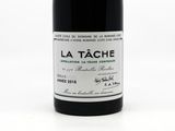 a bottle of wine that is sitting on a table