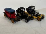 three toy cars that are sitting next to each other
