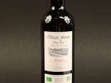 a bottle of wine that is sitting on a table