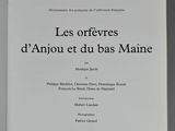 an open book with a black and white title on it
