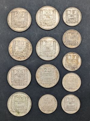 un lot de vingt pièces d'argent présentant différents motifs