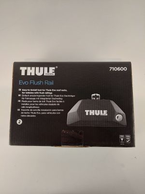 un gros plan sur une boîte de rails Thule Evo Flush