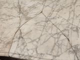 a marble table with a marble slab on top of it