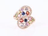 an image of a ring with multi colored stones on a white background