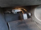 an image of a car ' s interior with a steering wheel and pedals