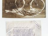 an old photo of a bicycle and a piece of paper