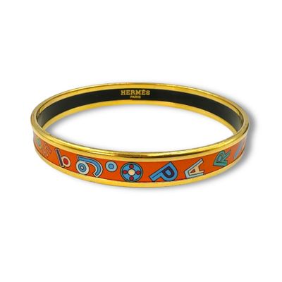 HERMES Paris, "Tohu Bohu" Bracelet jonc en métal doré émaill…
