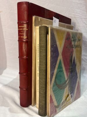 two books that are sitting next to each other on a table