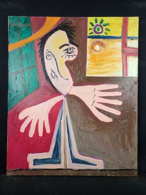 un tableau représentant un homme assis devant une fenêtre