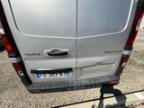 a silver van parked on the side of the road