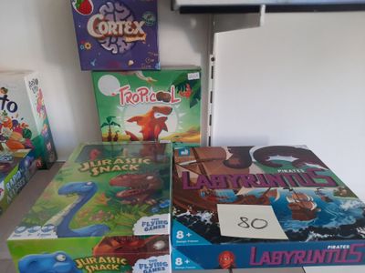 many board games on the table in the room