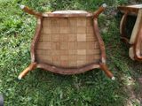 two chairs that are sitting in the grass