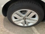 a close up of a tire on a car ' s rim