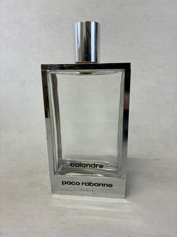 Important flacon de parfum en verre et armature en métal « Caland