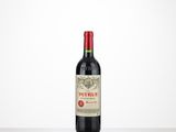 a bottle of red wine sitting on top of a table