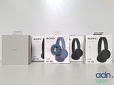 three boxes of sony headphones sitting on top of a table