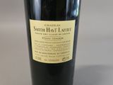 a bottle of wine that is sitting on a table
