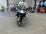 a motorcycle that is parked in a garage