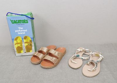 two pairs of sandals and a box of crochets