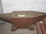 a large piece of metal sitting on top of a table