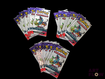 five packs of pokemon trading cards on a black background