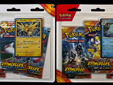 two packs of pokemon trading cards in the package