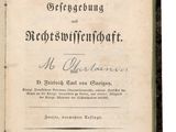 an old book with a black and white title on it