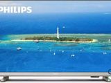 une télévision sur laquelle on voit, au centre de l'écran, l'image d'une petite île