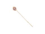 an image of a stick with a purple flower on it