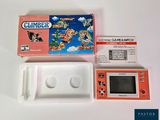 une console Nintendo avec un jeu à l'intérieur