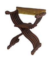 Fauteuil dit "Dagobert" de forme curule en bois mouluré et s…
