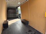 a view of the inside of a van with the door open