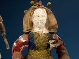a statue of a woman holding a knife in her hand