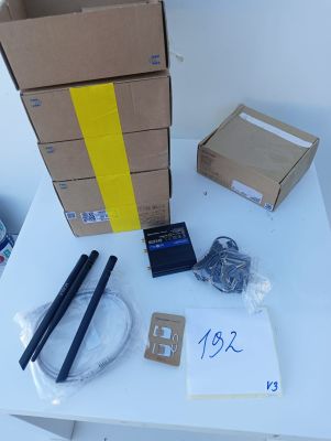 a table with a bunch of items and a box on it