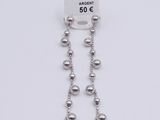 a close up of a pair of earrings on a white background
