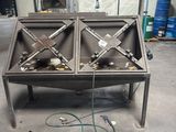 a picture of a metal table in a warehouse