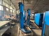 a machine that is sitting on a pallet in a warehouse
