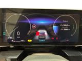 a picture of a car dashboard with a digital display on it