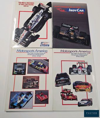 two books on the table with pictures of racing cars