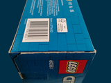 a box of legos sitting on a table
