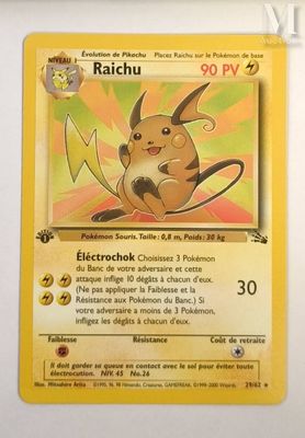 a close up of a pokemon card on a white surface