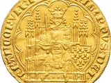a gold coin with an image of a man on a horse