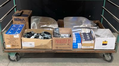 many boxes of assorted items in the back of a truck