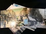 many old photos of people walking down the street