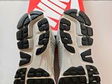 the soles of a pair of shoes are shown on a white surface